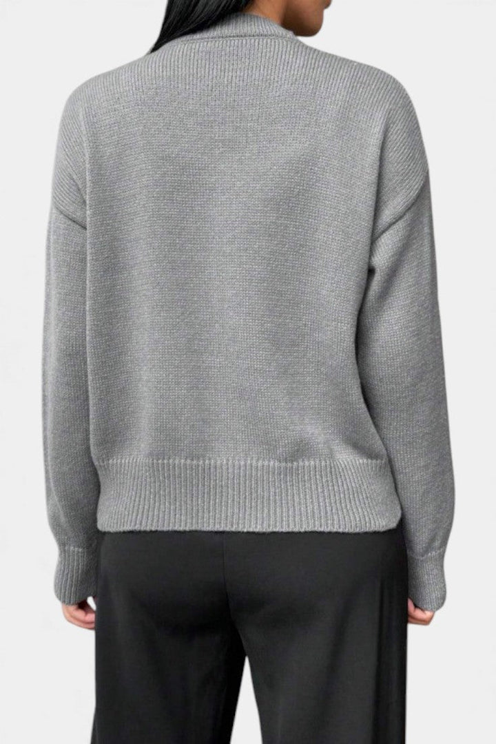 Carole Solid Color Knitted Sweater with Button Accents and Floral Embellishments